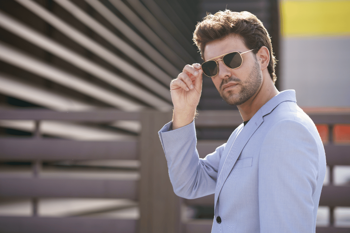 Man standing outside wearing sunglasses