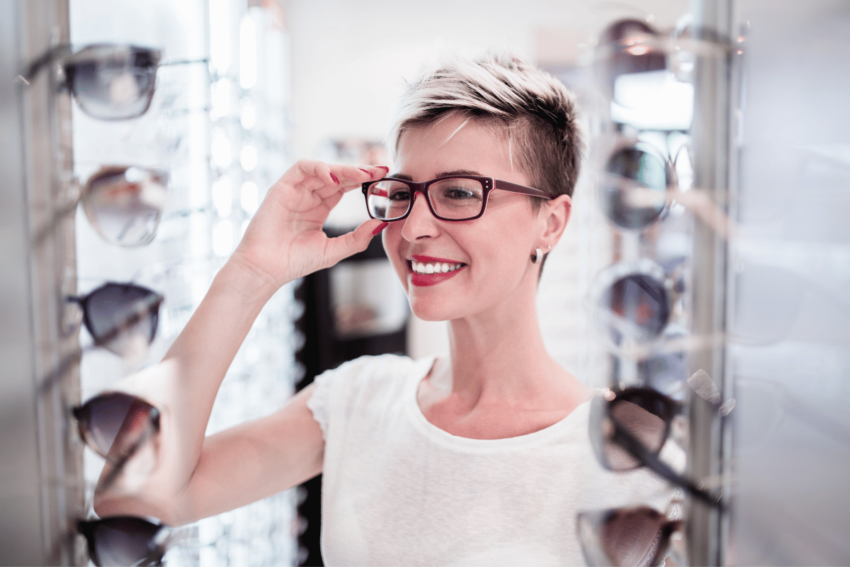 Ascension Optical December 2024 Blog Image woman trying on eyewear in an optical